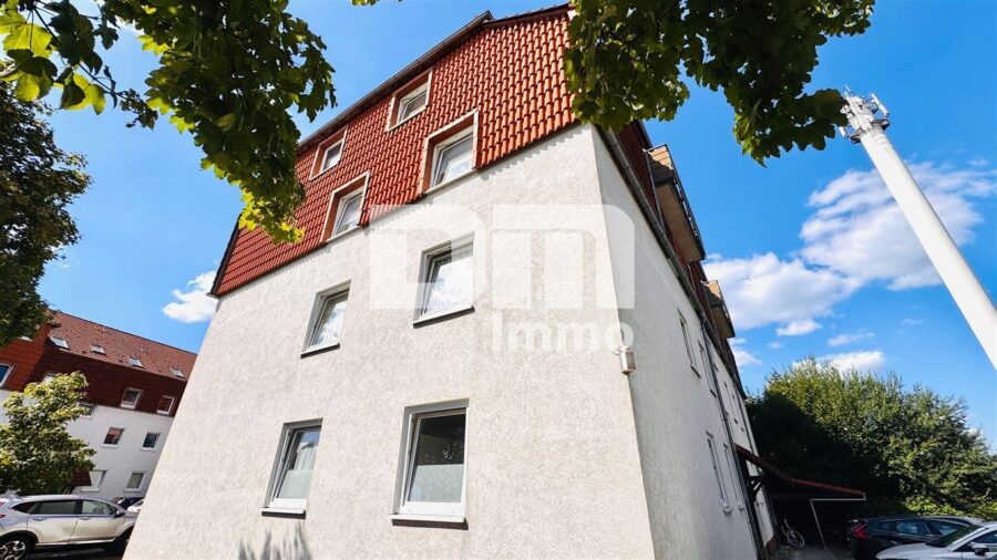 WE1 - Moderne Vierzimmerwohnung BJ 1991 mit sonnigem Balkon in zentraler Lage - Seitenansicht